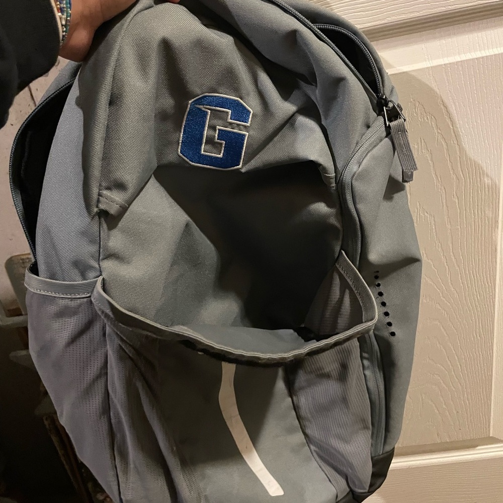 Nike Gray and Blue Backpack with Sporty Design and Durable Material